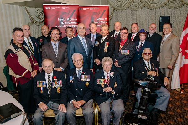 Vera Sherlock: first row in front, third from the left Sébastien Vincent: second row, second from the left (left of Minister Fantino) Photo credit: Veterans Affairs Canada