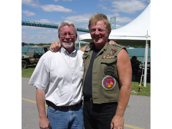 Johnson and Gidner in front of Ambassador Bridge